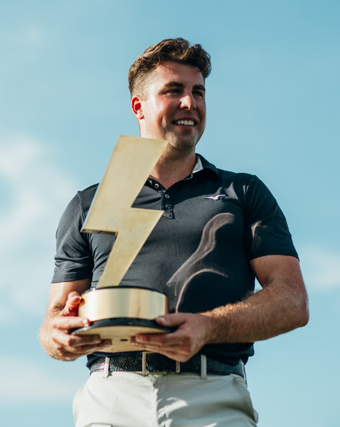 OJ with blitz golf trophy
