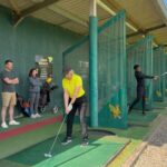 AI generated image of beginner golfers